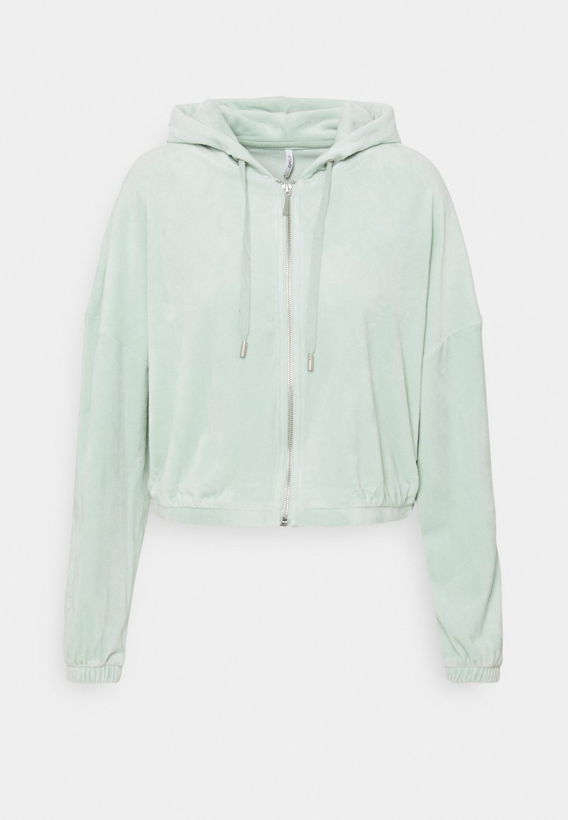 Sweat à capuche zippé vert menthe clair avec cordons, manches longues, poignets élastiques, et coupe légèrement courte et ample.
