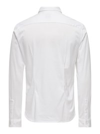 Chemise habillée blanche à manches longues vue de dos, avec poignets boutonnés et col classique.