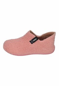 Pink, fuzzy slippers with a soft texture, slip-on design, and a black label on the side. The sole is pink and textured for grip.