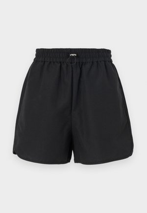 Black shorts with an elastic waistband, drawstring detail, and side slits. Made from lightweight fabric, offering a relaxed fit.