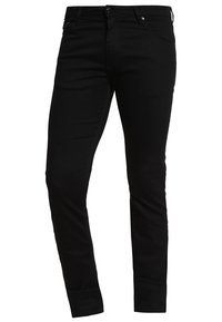 Vaqueros de mezclilla negra con corte ajustado, que cuentan con cinco bolsillos, cremallera y trabillas para el cinturón, fabricados con una suave mezcla de algodón elástico.