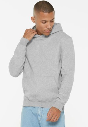 Gray hoodie made of soft material, featuring a front pocket, adjustable drawstring hood, and ribbed cuffs with a relaxed fit.