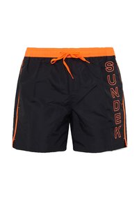 Costume da bagno neri con elastico in vita e lacci arancioni. Presenta strisce laterali arancioni e la scritta "SUNDEK" lungo il lato sinistro.
