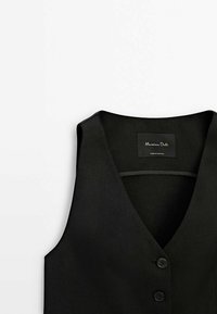 Zwart mouwloos vest met een V-halskraag, voorzien van twee knopen aan de voorkant, gestructureerde stof en een ingestikte label met de tekst "Massimo Dutti".