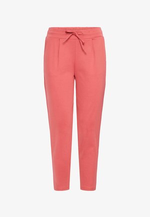 Korallilised jogger-püksid elastse vöökoha ja paelaga, millel on kaks külgtaskut ja kitseneva sääre kujundus, valmistatud pehmest kangast.