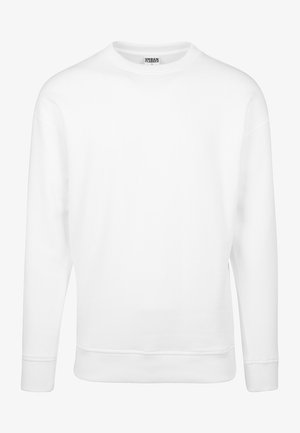 Bela športna majica iz mehkega blaga. Ima dolge rokave, okroglo ovratnico, rebraste manšete in rob. Preprost in minimalističen dizajn.