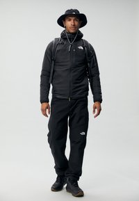 The North Face HIGHER RUN JACKET - Veste coupe-vent - black