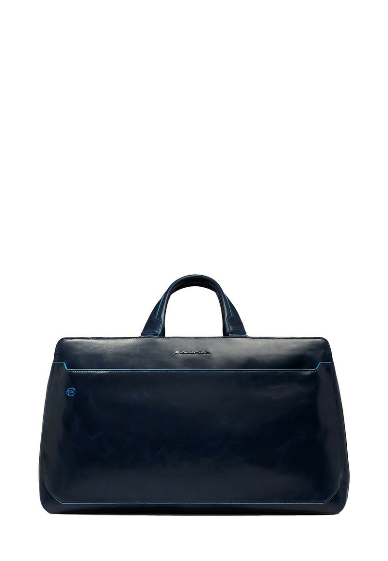 Marineblaue Ledertasche mit glänzendem Finish, rechteckiger Form, zwei Griffen und einer Fronttasche mit kontrastierenden blauen Nähten.