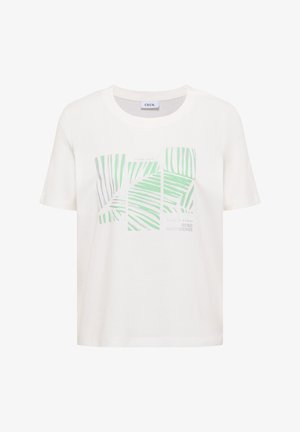 T-shirt blanc à manches courtes avec motif abstrait de feuilles vertes et grises et texte discret à l'avant, col rond, avec une étiquette indiquant "CECIL".