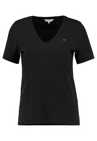 Schwarzes T-Shirt mit kurzen Ärmeln und V-Ausschnitt aus Baumwolle. Mit kleinem Logoakzent in Brustnähe, schlichtes und klassisches Design.