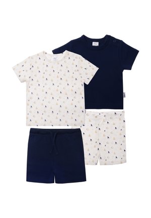 Two sets of children's clothing: a white shirt with sailboat pattern, navy blue shirt, navy blue shorts, and white shorts with a matching pattern.