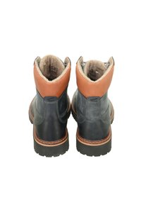 Leather boots with a dark blue body and brown leather ankle collar, featuring a soft lining and textured rubber sole for traction.