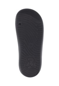 Semelle de chaussure en caoutchouc noir avec un motif texturé en vagues, présentant un trou circulaire et un logo en relief en forme de "R."