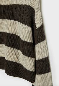 Striped sweater featuring alternating dark brown and beige stripes, textured knit fabric, and a loose, oversized fit with a wide neckline.