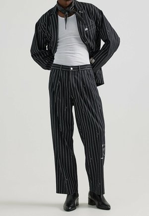 Pantalones - black