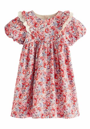 Robe fleurie pour tout-petit avec manches bouffantes, devant à volants et bordure en dentelle ajourée dans des tons de rouge, rose, violet et blanc.