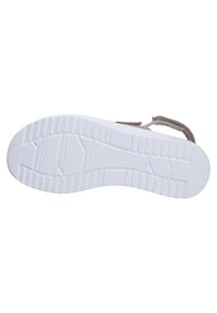 White rubber sole with textured grip and ridged pattern; light brown upper section with adjustable strap; crafted from soft material.