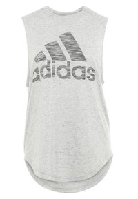 Harmaa ilmanhihaisissa toppi, joka on valmistettu kevyestä kankaasta, jossa on pyöreä helma ja suuri musta Adidas-logo rinnassa.