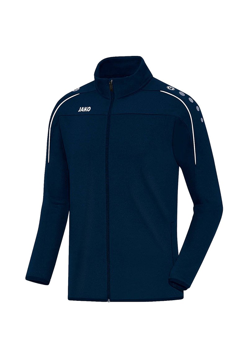 Marinefarbener Reißverschlussjacke aus weichem Stoff, mit hohem Kragen, weißen Akzenten und Schulterknöpfen. Markenlogo "JAKO" auf der Vorderseite.
