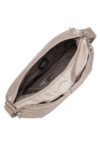 Beige fabric crossbody bag with a smooth texture, zip closure, internal pocket, and a round logo accent, featuring a detachable strap.