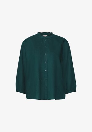 Camicia a maniche lunghe color teal scuro con colletto alto, apertura con bottoni e maniche leggermente a sbuffo. Realizzata in un tessuto leggero e liscio.