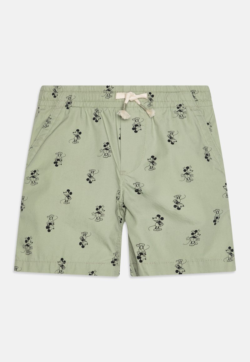 Shorts verts en tissu léger, arborant un imprimé noir de Mickey Mouse en motif répétitif, un taille à cordon de serrage et des poches latérales.