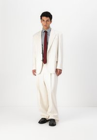 HUGO FEDIX - Pantalones - natural