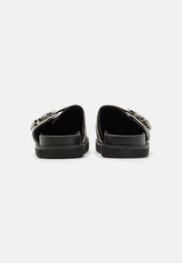 RAID NELLIE - Mules - black