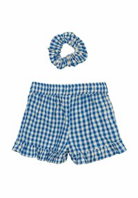 Blå och vit rutiga shorts med volangkant, kompletterade med en matchande scrunchie. Båda plaggen har en mjuk bomullskvalitet.