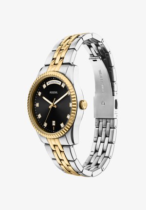 Orologio Fossil con quadrante nero, indici delle ore color oro, cassa in acciaio inossidabile e cinturino in metallo bicolore con motivo lavorato.