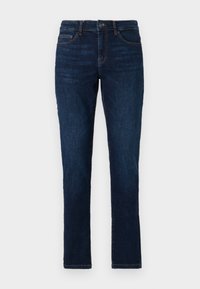 Mörkblå smala jeans med fem fickor, knappstängning och subtila slitningar på framsidan av låren.