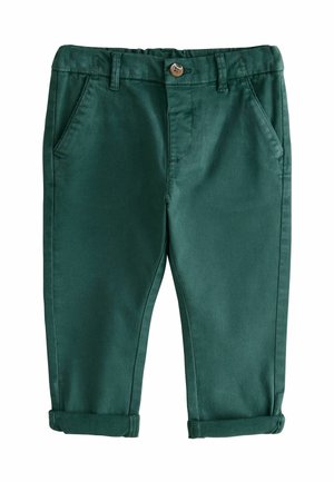 Dunkelgrüne Kinderhose mit Knopfverschluss, Gürtelschlaufen, Seitentaschen und umgeschlagenen Säumen.