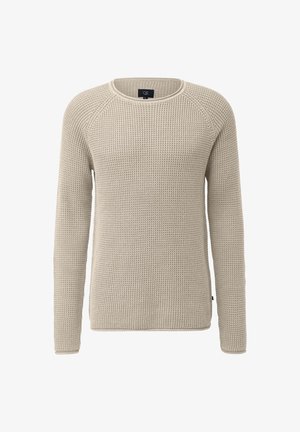 Šviesiai rudas megztas džemperis su apvaliu kaklu, ilgomis raglan rankovėmis ir tekstūrinio mezgimo raštu. Yra subtilus apvadas ir etiketė šone.