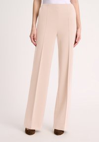 MORA - Trousers - beige