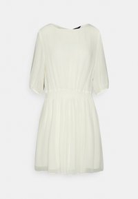 Lyhythihainen, valkoinen mekko, jossa on pyöreä pääntie. Mekossa on istuva vyötärö ja levenevä hame, joka on valmistettu kevyestä, virtaavasta kankaasta.