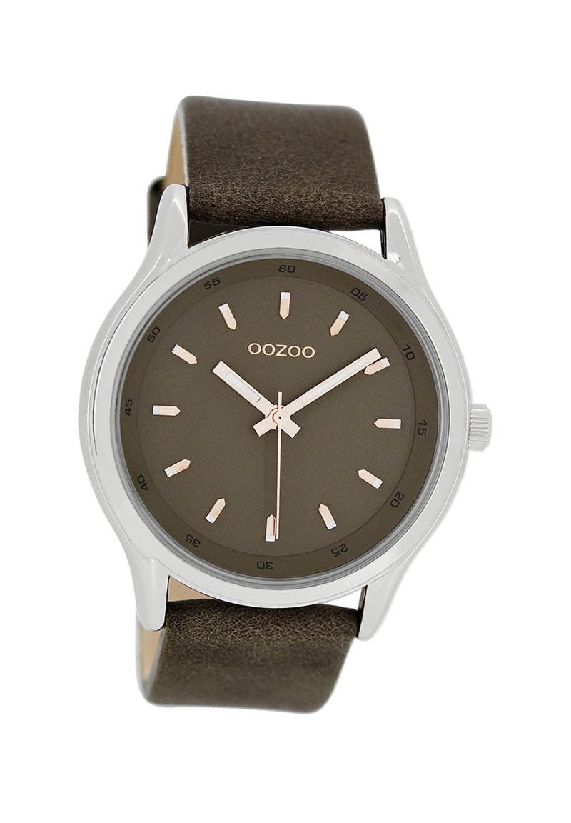 Brown leather strap watch with a round silver case. Dark brown dial featuring rose gold hour markers and hands. Minimalist design.