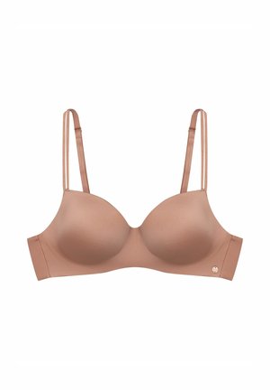 Light brown bra with smooth, molded cups and adjustable thin straps. Features a subtle logo detail on the left side.