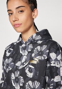 Puma CLASS ACT HOODIE  - Jersey con capucha - black