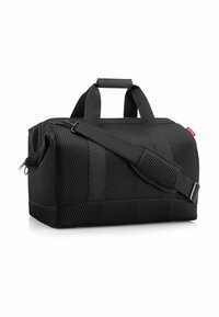 Borsone nero con superficie in rete testurizzata, robuste cinghie in nylon e tracolla regolabile. Dotato di chiusura con zip per un accesso sicuro.