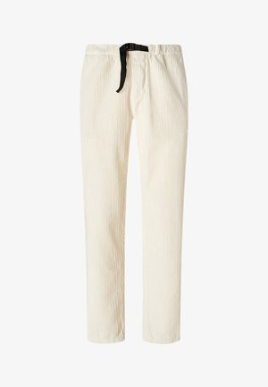 Pantalon en velours côtelé couleur crème, avec une coupe droite, doté d'un cordon de serrage noir. Le tissu présente une texture côtelée verticale.