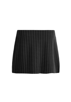 Mini-jupe noire avec motif à carreaux blancs, coupe droite et légère évasement en bas, présentée sur fond blanc.