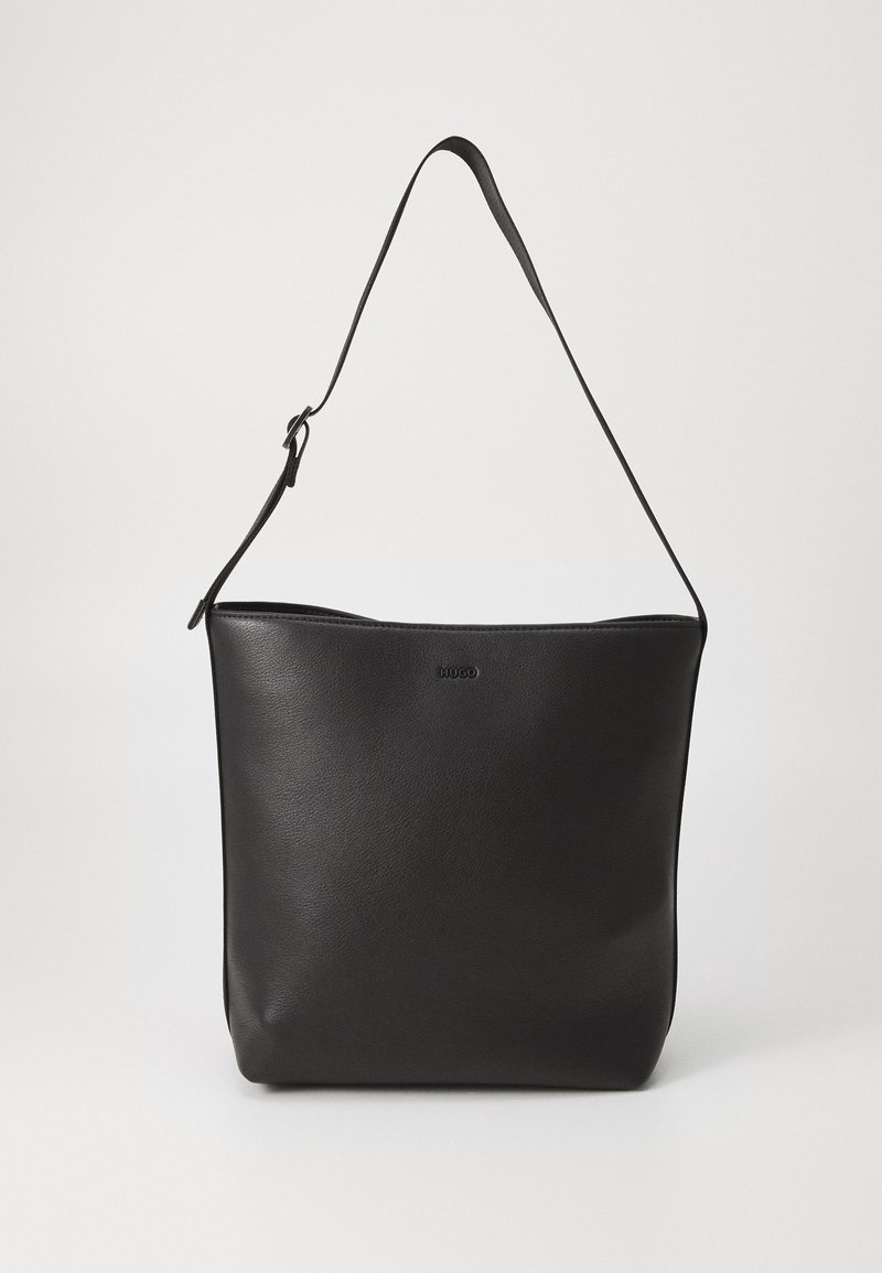 Sac à épaule en cuir noir avec bandoulière réglable et logo "HUGO" discrètement embossé au centre devant.