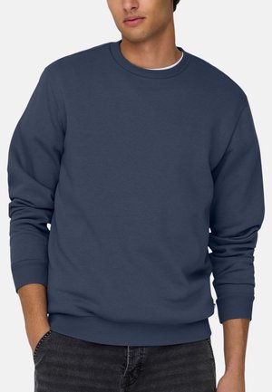 Sweatshirt bleu marine en mélange de coton, avec un col rond, des poignets côtelés et une coupe décontractée. Design minimaliste, sans motifs ni logos visibles.