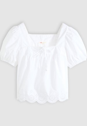 Biela krátka blúzka s krátkym rukávom, štvorcovým výstrihom, nafúknutými rukávmi, predným zaväzovaním a lemom s kvetinovým vykrojením.