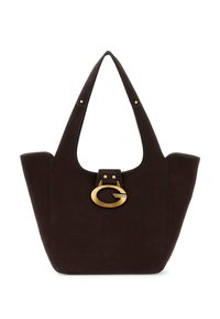 Borsa tote in camoscio marrone con due manici a spalla, un accento circolare in tonalità oro e una base piatta. Texture liscia con dettagli hardware minimi.
