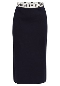 Jupe crayon noire longueur genoux avec ceinture élastique blanche présentant des motifs rectangulaires et linéaires noirs.