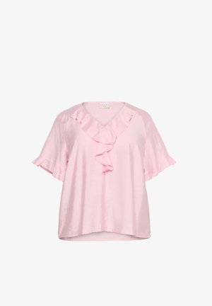Ružový blúzok s krátkymi volánovými rukávmi a výstrihom do V, s dekoračným volánom na prednej strane. Vyrobený z hladkej, ľahkej tkaniny.