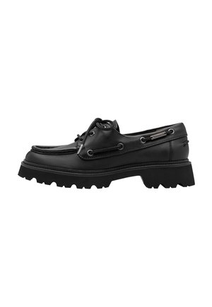 Black leather boat shoe with thick lug sole, lace detail around the sides, and matching black laces on a white background.