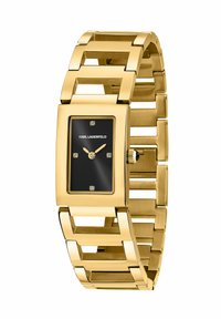 Orologio rettangolare in tonalità oro con quadrante nero, quattro piccoli diamanti e bracciale a maglie geometriche. Presenta una corona sul lato.