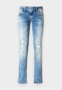 Jean skinny bleu délavé avec des trous usés sur le devant des cuisses et aux genoux, avec deux boutons et des poches avant.